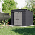 Suncast Modernist outdoor storage shed assembled with sliding barn doors