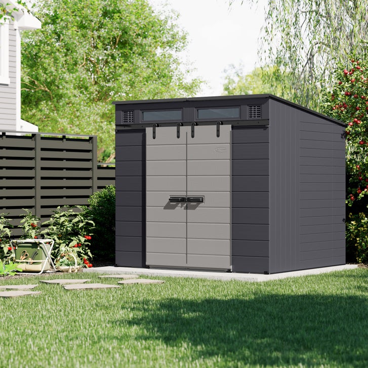 Suncast Modernist outdoor storage shed assembled with sliding barn doors